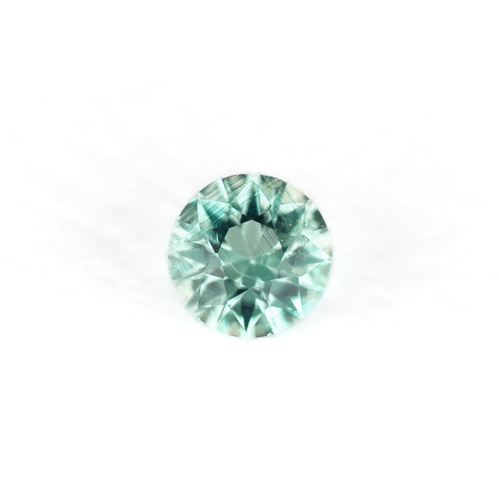 0.11 Carat Round Emerald
